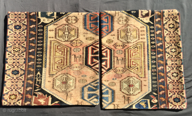 Shirwan Kuba rug fragments turned into two lovely pillows with black cotton back and zipper.
Sizes are cm 55x55 and 50x60.
Fragments are datable roughly to the 3rd quarter of the 19th century.
Enjoy the  ...