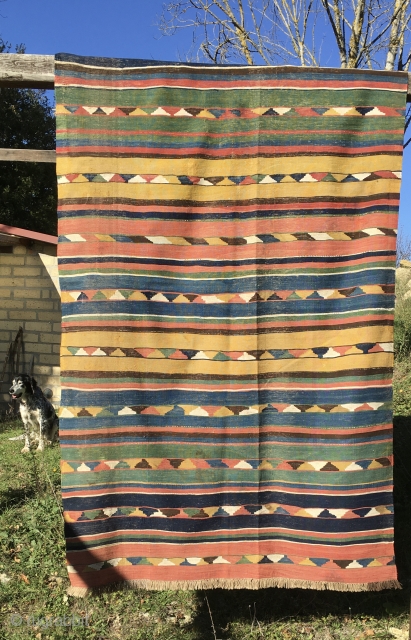 Caucasian Kazak kilim. Antique, very very thin, with great natural saturated colors. In good condition. Condition issues: some old restoration and a couple of stains. A supper flat weave.    