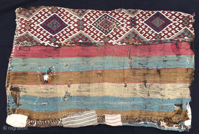 Straight from the nomad's tent. East Anatolian cuval or storage bag. Cm 75x120. 100 years old or so. Complete and with all the patches in the world. Great natural saturated colors. An  ...