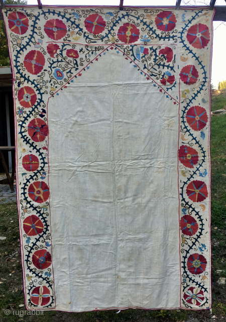 SUZANI KAPUNUK
Beautiful, Antique Uzbek Suzani Kapunuk or yurt/door hanging
Cm 142x216. Uzbekistan.
Late 19th/early 20th century
Natural Silk fiber embroidery on cotton with awesome natural colors.
In good condition, some black stitches are oxidized.

Please email carlokocman@gmail.com 