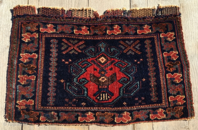 Antique Afshar rug panel. Probably a bag front. Cm 29x51. End 19th century. Iconic. Emblematic. Totemic. The Afshar were really creative artists. And prolific. Every work is almost always a misterious work  ...
