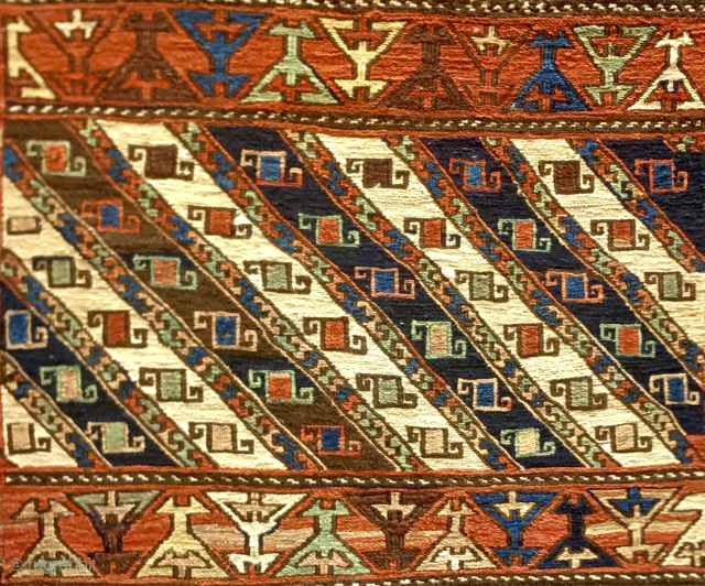 Shahsavan Moghan Sumack mafrash end panel.
Size is cm 38x49 ca. Datable 1880/1890.
The Shahsavan loved to use the moharamat/stripes pattern, in different variations. Here, in this panel we have diagonal moharamat ...