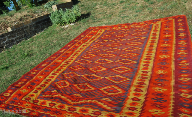 Tracia Orange Kilim from the Ottoman Balkans. 
Cm 390x315 or ft 12.8x10.3. 
Second half 19th century. 
In overall good condition. Few small holes, some old minor restorations. 
Rare, beautiful. Old pics, sorry.  ...