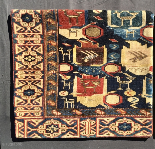 Antique Beautiful Collectable Caucasian Shirwan Kuba
rug fragment turned into pillow.
Cm 48x54 - In 18,9x21,2
Datable 1860/1880
Black cotton back with zipper
Rare & Beautiful
PS.: two such pillows available....pls ask