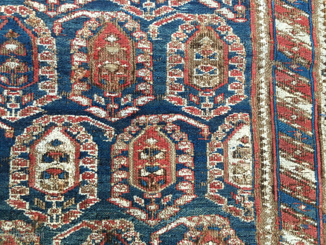 Shahsavan sumack bag face. 
Cm 46x48. Probably mid 19th c. 
Damaged in the lower part, but still beautiful and extremely rare, with great pattern and fantastic dyes. 
Central Field: The deep indigo  ...