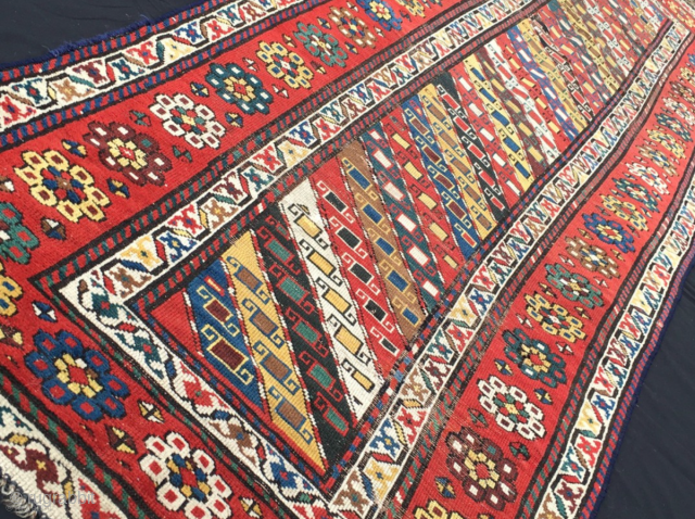 Great Caucasian rug.
Not too long, beautiful.
Cm 90x275.
Datable 1880sh.
Kazak? Talish? Gendje? Doesn't matter, it's really an amazing rug
with lovely pattern with all those diagonal stripes,
the various colorful borders ...