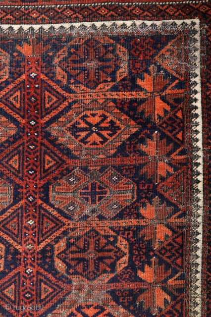 Baluch Timuri, a so called Sangtshuli; about 1880; 105 x 186cm (3`5”x 6`1”) rare seen main border (not found comparable border in Baluch rug books), like a row/chain of triangle amulets (an  ...