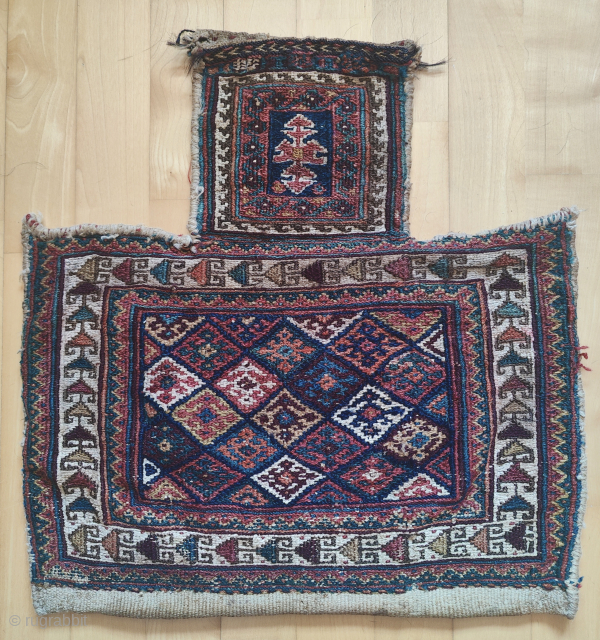 Afshar Salt bag
Front in Sumak technique, back plane weave
Beginning of 20th cent. 
Size 52 x 52 cm
Further information: martin@baluch.ch              