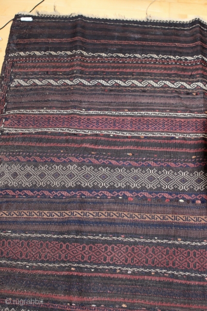 Baluch Kilim main carpet; end of 19th c.; made in two lines; many different horizontal stripe designs; small sumac border;Kilim is in very good condition;        