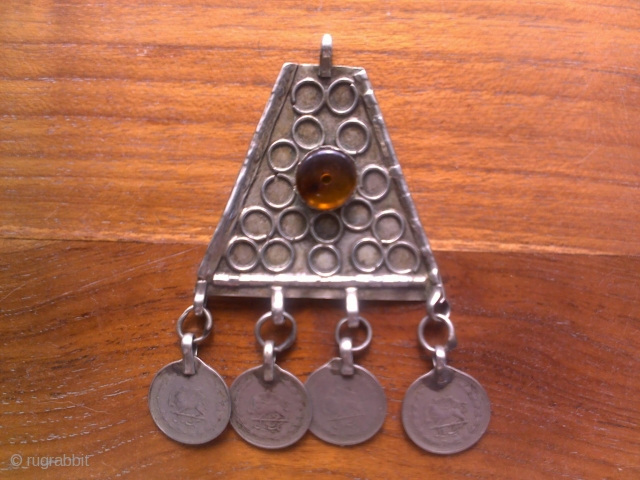 Metal Amulet, with original coins, light enough to be worn around the neck, a striking old piece.
postage extra , payment through Paypal only.          