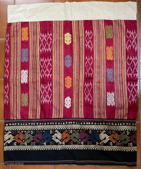 A sinh (traditional tubular skirt) hand woven in cotton and silk; the material is fairly soft. Bought in Phonsavan, Laos, it was acquired with other pieces that were clearly used, but this  ...