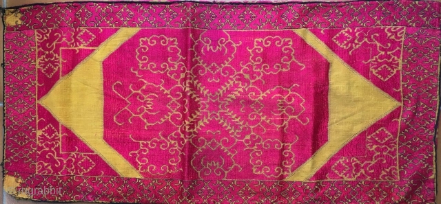 Pashtun cushion cover from the Swat valley (Pakistan) embroidered in floss silk on handwoven cotton. The yellow ground and brilliant pink/red embroidery is a very traditional combination.The face is in good condition,  ...