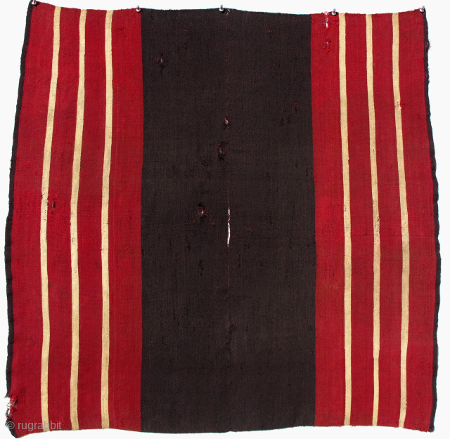 Aymara Ccahua Man's Ponchito.  This finely woven textile consists of two joint panels with a neck slit. The purple/brown center is woven using Chimi technique which involves plying two different colored  ...