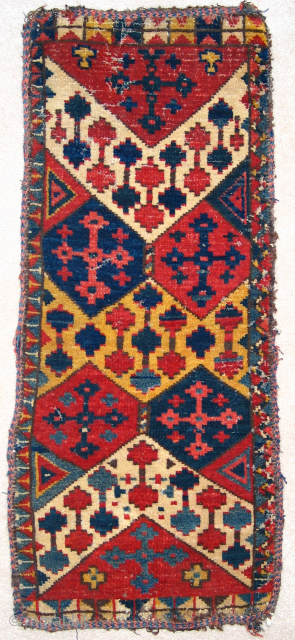 Kyrgyz chavadan or Uzbek napramach, showing ikat inspired design. 
82 x 35 cm. These pieces are rare and were subject of a lively discussion on Turkotek many years ago. http://www.turkotek.com/misc_00028/kungrad.htm

igo.licht@gmail.com   