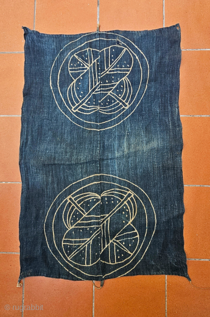 Japanese antique indigo-dyed hemp textile umakake, paste resist dyeing technique tsutsugaki. Used probably as a horse cover or futton cover. Family crest of crossed feathers. 63 x101 cm. 
Please contact igo.licht@gmail.com  
