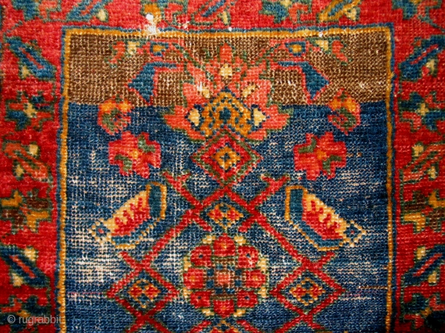 Persian Senneh Bagfaces in used condition, 2nd half 19th c. This is a rare pair of fine (camel?)wefted bagfaces with shiny glossy wool and all vegetable dyes, showing small birds and a  ...