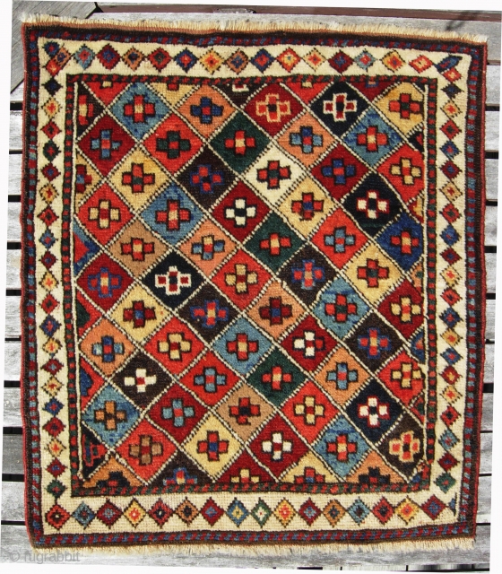 Shasavan bag face 1-6\" x 1-10\"  c. 19th century thirteen colors including diamonds and details in un dyed camel hair            