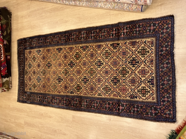 3'6'' x 7'4'' / 107cm x 225cm An antique Baluch rug, woven at the end of the 19th century, from eastern border area of Iran.

for more info and detailed pics : https://www.instagram.com/carpetusrugs/ 