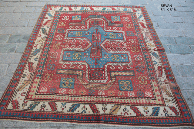 Very early Kazak Mid-19th C. Perhaps Earlier.

There are areas has been repiled on the rug possibly the work has been done 20 years ago.

         
