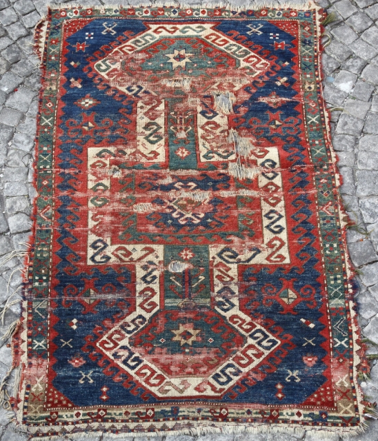 Early Armenian Sewan from second quarter of 19th C. (1825-1850) with unusual pinwheel figures on the border. Very soft handle and seccade size.          