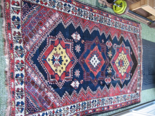 Luri rug 1910?
Nice tribal rug with clowing colors.Some repairs and long sides damaged.