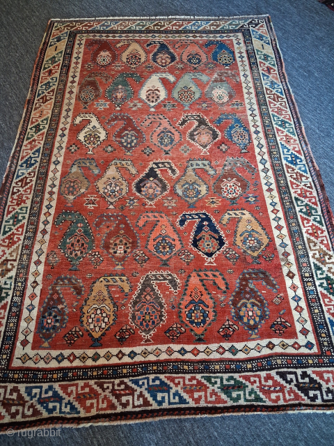  Caucasian antique rug with Boteh patterns.  Finely woven,  probably Gendje .
. 118x187cm . Contains several very old repairs. Contact cetinakbas@hotmail.com for more details.       