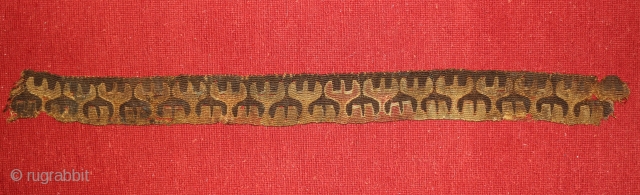 Central Asian wool tapestry fragment. 2.5  x 30 inches. Both sides have the original selvedge. The design is a row of reciprocal antlers, probably denoting a clan symbol. Approximately 2000 years  ...