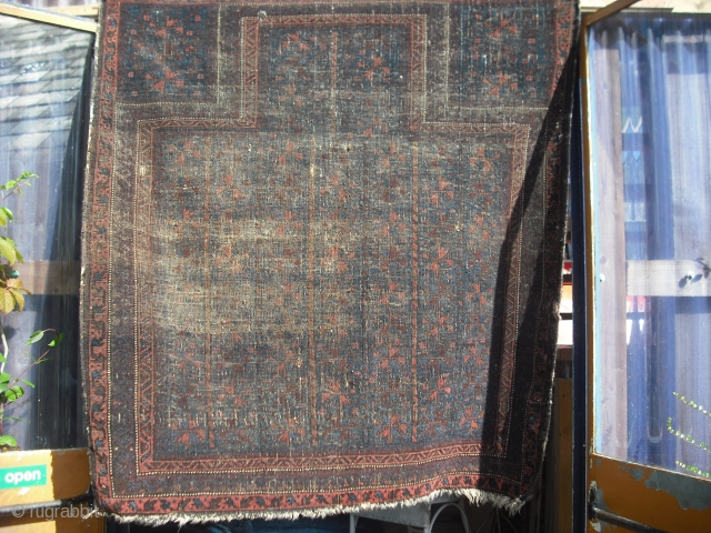 Square Baluch 4'x 3'10". Very minimal, very dark, very worn . Rather cool .                   