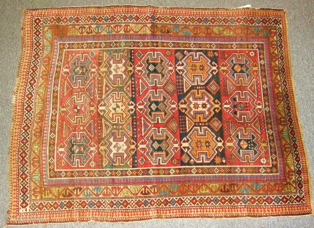 Very colorful shirvan ,unusual motifs, slight fold wear.Mid 19th century.                       