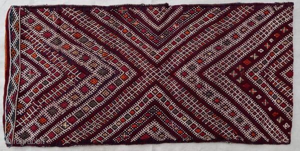 Authentic kilim cushion from the Moroccan Middle Atlas, circa 1950.

Origin : Morocco
Period : around 1950
Size : 90 x 43 cm
Material : wool and cotton
Good general condition
Handwoven

✦ Price and photos on www.christiandoux.com/products/moroccan-pillow-90-43  