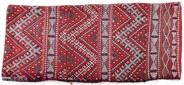 Authentic kilim cushion from the Moroccan Middle Atlas, circa 1950.

Origin : Morocco
Period : around 1950
Size : 72 x 31 cm
Material : wool, cotton, silk seams
Good general condition
Handwoven

✦ Price and photos on www.christiandoux.com/products/moroccan-pillow-72-31 