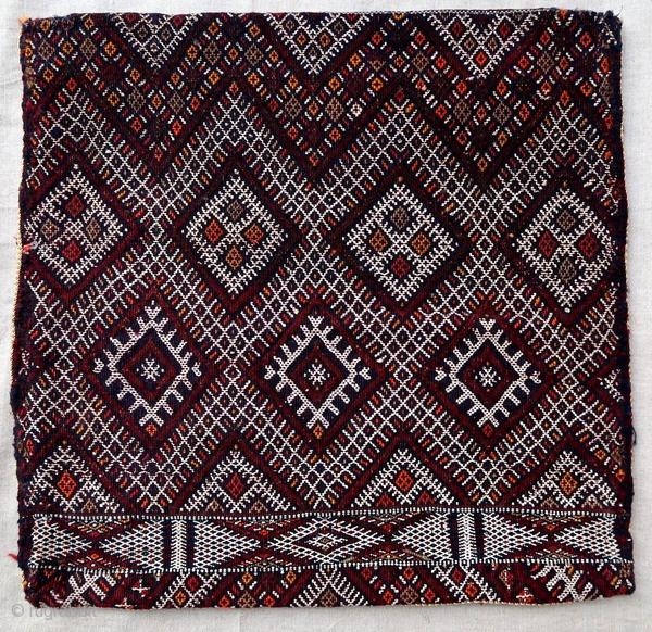 Authentic kilim cushion from the Moroccan Middle Atlas, circa 1950.

Origin : Morocco
Period : around 1950
Size : 47 x 45 cm
Material : wool and cotton
Good general condition
Handwoven

✦ Price and photos on www.christiandoux.com/products/moroccan-pillow-47-45  