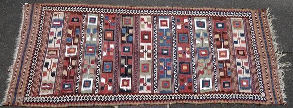 Ghashghai kilim from the early 20th century.

Origin : Persia
Period : early 20th century
Size : 350 x 143 cm
Material : wool on wool
Good general condition, some snags
Vegetable dyes
Handwoven

This kilim has been cleaned by  ...