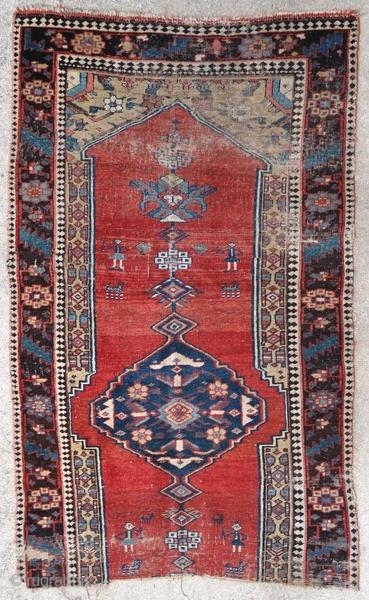 Fragment of Kurdish rug.

Origin : Kurdistan
Period : before 1900
Size : 176 x 108 cm
Material : wool on wool
Worn fragment
Handwoven

This rug has been cleaned by a professional.

✦ Price and photos on www.christiandoux.com/products/kurdish-rug-176-108  