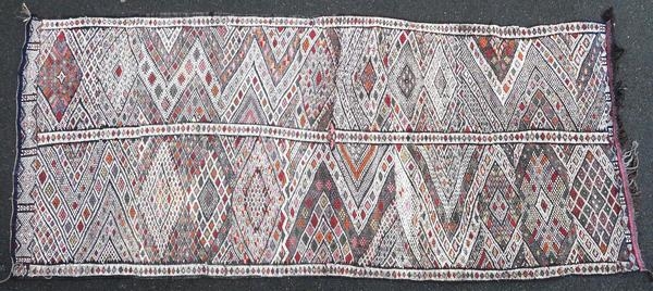 Berber kilim from the Middle Atlas in Morocco, made in 1950 or before, and in very good condition. This authentic piece has not been woven for trade.

Origin : Morocco
Period : 1950 or  ...