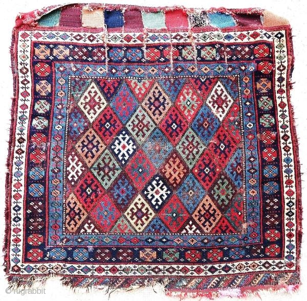 Old Kurdish rug, Jaff, around 1900. In good general condition with wear and gaps.

Origin : Kurdistan
Period : around 1900
Size : 92 x 90 cm
Material : wool on wool
Good general condition with wear  ...