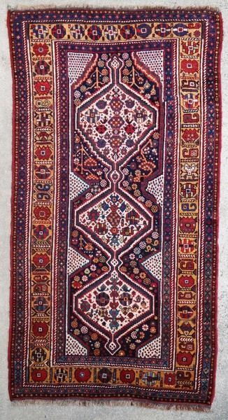 Ancient Ghashghai rug in good general condition with some slight wear. Redone selvedges.

Origin : Persia
Period : around 1900
Size : 240 x 122 cm
Material : wool on wool
Good general condition with some slight  ...