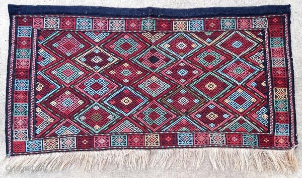 Anatolia bag face, kilim technique, embroidered in good general condition.

Origin : Turkey
Period : early 20th century
Size : 106 x 56 cm
Material : wool on wool
Good general condition
Vegetable dyes
Handwoven

This rug has been cleaned  ...