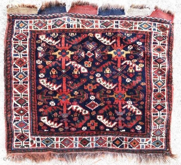 Ancient Ghashghai bag face. Good general condition.

Origin : Persia
Period : early 20th century
Size : 64 x 57 cm
Material : wool on wool
Good general condition
Vegetable dyes
Handwoven

This rug has been cleaned by a professional.

✦  ...