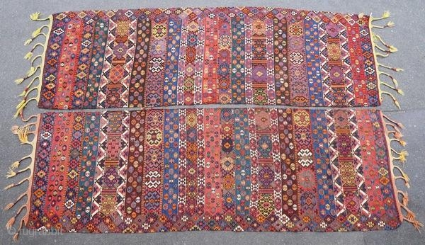 Old and original Kurdish kilim, around 1900.

Origin : Kurdistan
Period : around 1900
Size : 2 x (305 x 100) cm
Material : wool on wool
Good general condition
Vegetable dyes
Handwoven

This kilim has been cleaned by a  ...