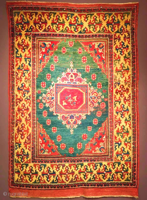 West Anatolian 'Ghirlandaio' Rug, late 17th century. Minor light localised wear, a repaired tear and reweave to one side, a few minute cobbled repairs otherwise very good condition. 6ft.11in. x 4ft.8in. (210cm.  ...