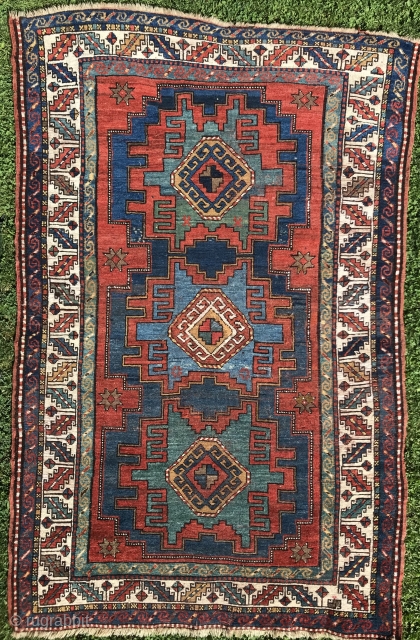 Antique Caucasian rug, 186x118cm, all good colours including a beautiful forget-me-not blue. Good condition, gently washed. Please contact here: christinawiese.ceramics@gmail.com             