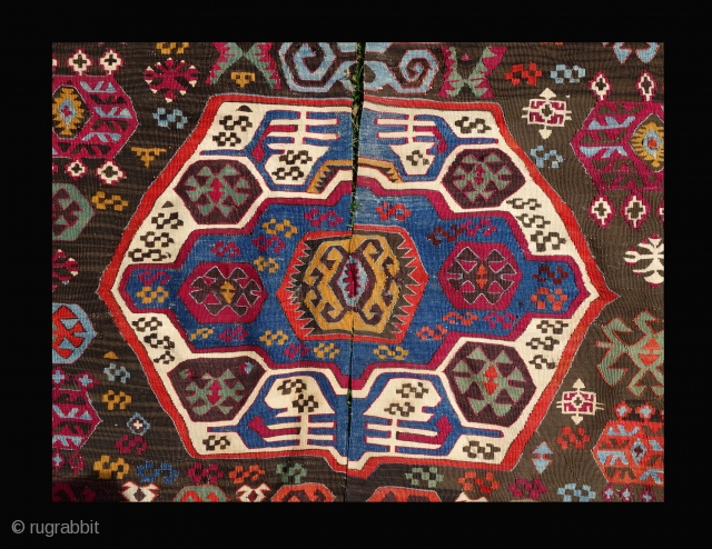 Antique Nigde kilim, mid to last quarter of 19th century, 350X160cm. Fabulous, saturated colours, lustrous wool. Alas it has been cut in the middle to be used as 4 fragments, some tiny  ...