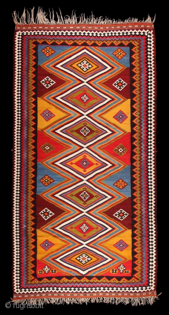 exceptionally colored Qashqai kilim of the Kashkuli tribe, 
exceptional size 325 cm times 172 cm
published in "The kilims of the collection Neiriz" (Kilims aus der Sammlung Neiriz,
plate 110, Hamid Sadighi, 2014  