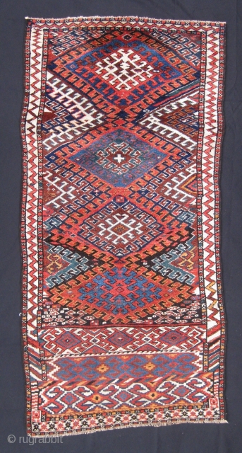 Funky Quchan Kurd with good colours, northeast Iran, ca. 1900. Minor repairs to sides and ends, overall good condition.
1.80m x 0.88m 

SOLD           