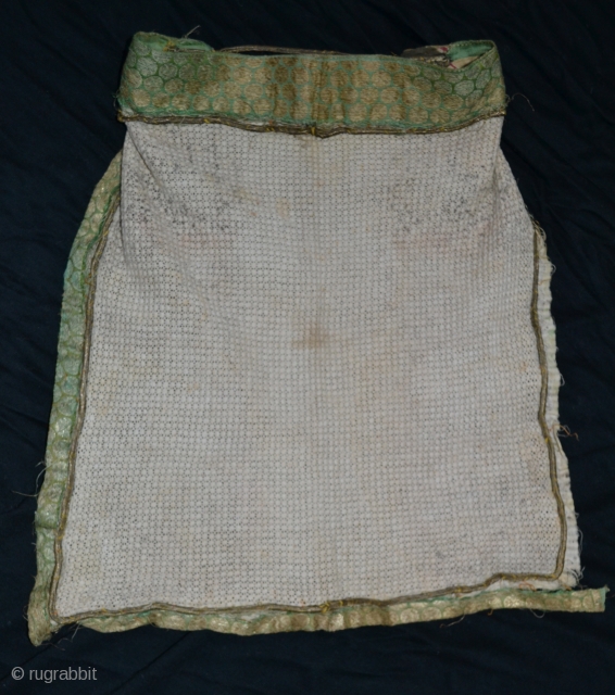 Khotan East Turkistan Tarim cotton lace veil trimmed with gilt / silk brocade.
There is another in my collection. Various precious trims are used as jere with a silk brocade either Indian /  ...