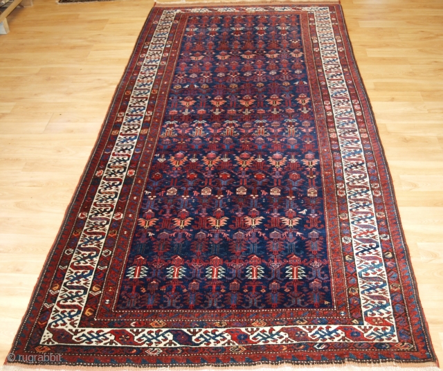 Antique Kurdish kelleh long rug with dragon border. www.knightsantiques.co.uk 

Circa 1900

A very good quality rug with excellent colour, the rug is very well drawn with an all over repeat design of shrubs  ...