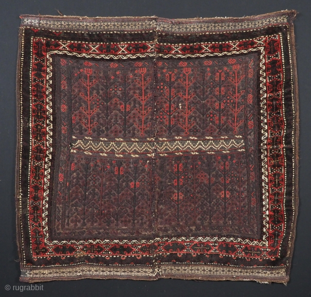 A scarce Baluch sofreh (eating cloth) these were placed on the ground for food to be served on. www.knightsantiques.co.uk 
Size: 2ft 11in x 2ft 8in (89 x82cm).
Circa 1880.

This outstanding example was woven  ...