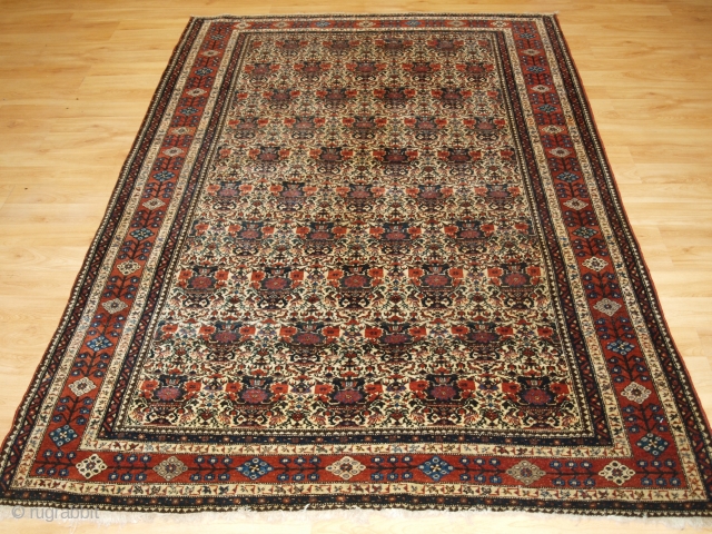 Antique Abedeh rug with the classic Zili Sultan ‘vase and peacock’ design, the rug has excellent soft colours on an ivory ground. www.knightsantiques.co.uk 

Size: 7ft 5in x 5ft 0in (227 x 152cm).  ...