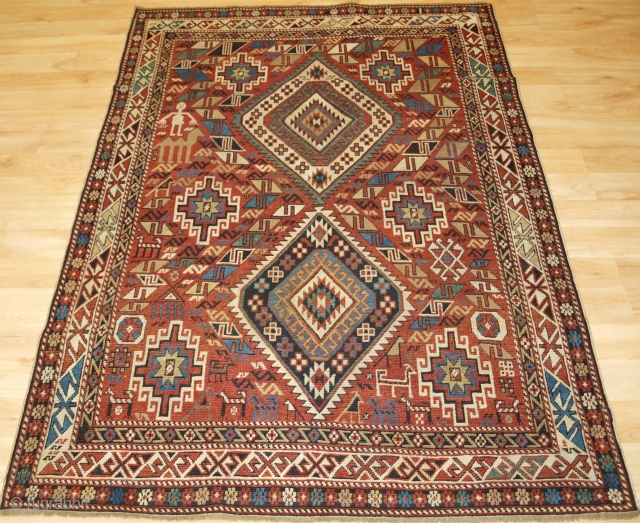 Antique Caucasian Daghestan rug with two diamond medallions on a soft terracotta red ground. www.knightsantiques.co.uk 

Size: 5ft 10in x 4ft 0in (178 x 123cm).

Circa 1890.

An excellent Daghestan rug with two large central  ...